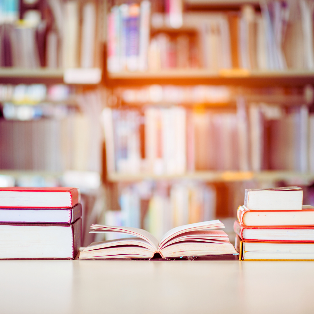 books on a table in a library