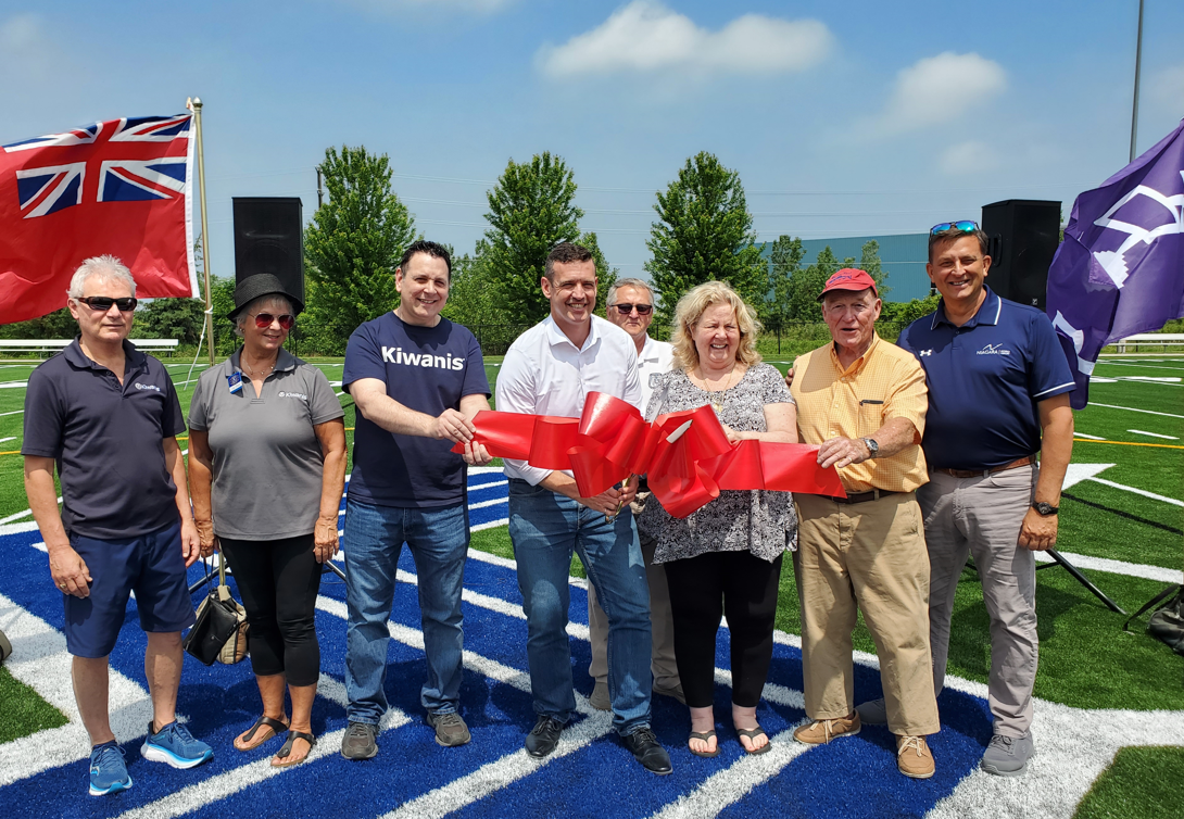 Ribbon cutting at the reopening of the Kiwanis Turf Field.