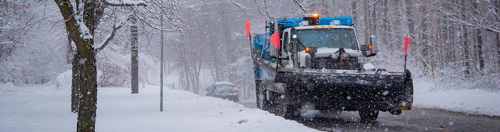 Snow plow on City road